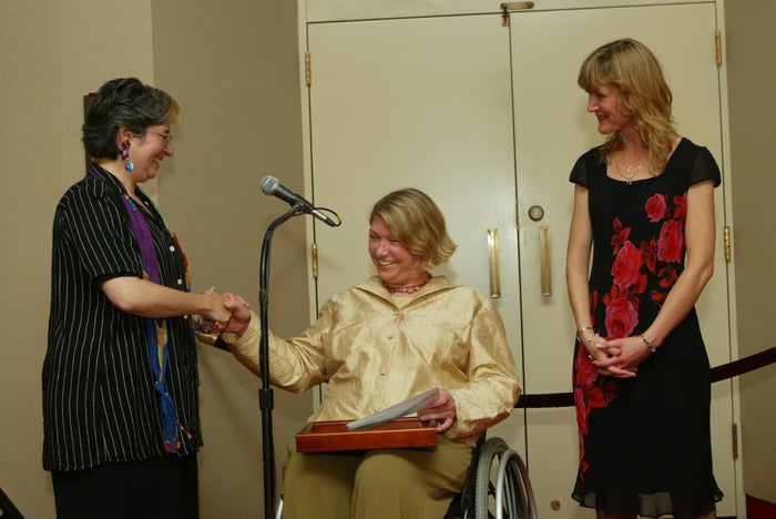 Betty presenting Beth Ziebarth, Smithsonian Accessibility Manager, with one of the inaugural Kennedy Center LEAD Awards for Excellence in Leadership.