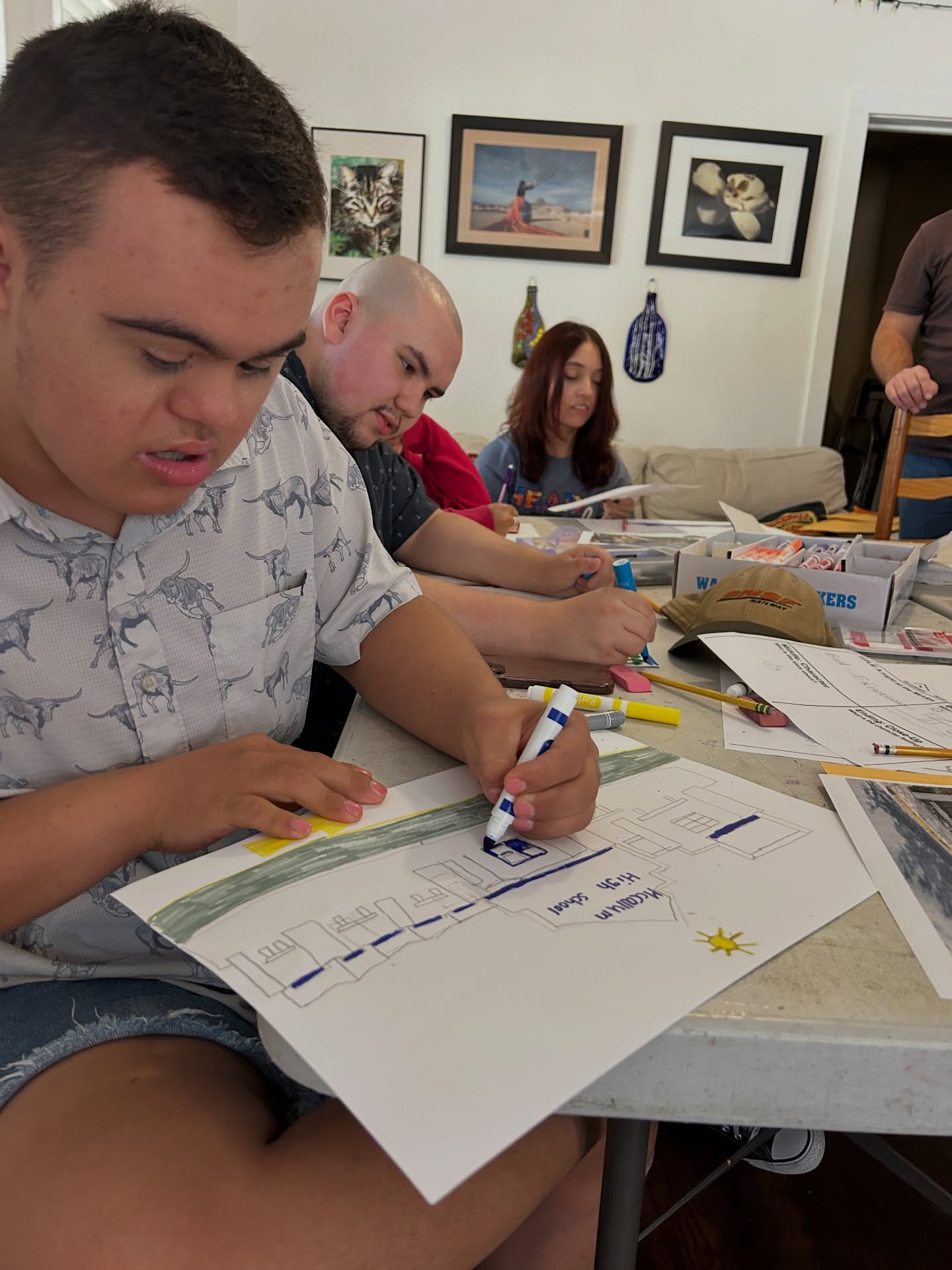 Youth with disabilities at Art Spark Texas engaging in a hands-on animation workshop
