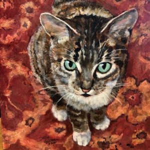 painted pet portrait of a tabby cat with green eyes on a red floral rug.