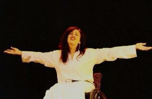 Maria Palacio with arms out