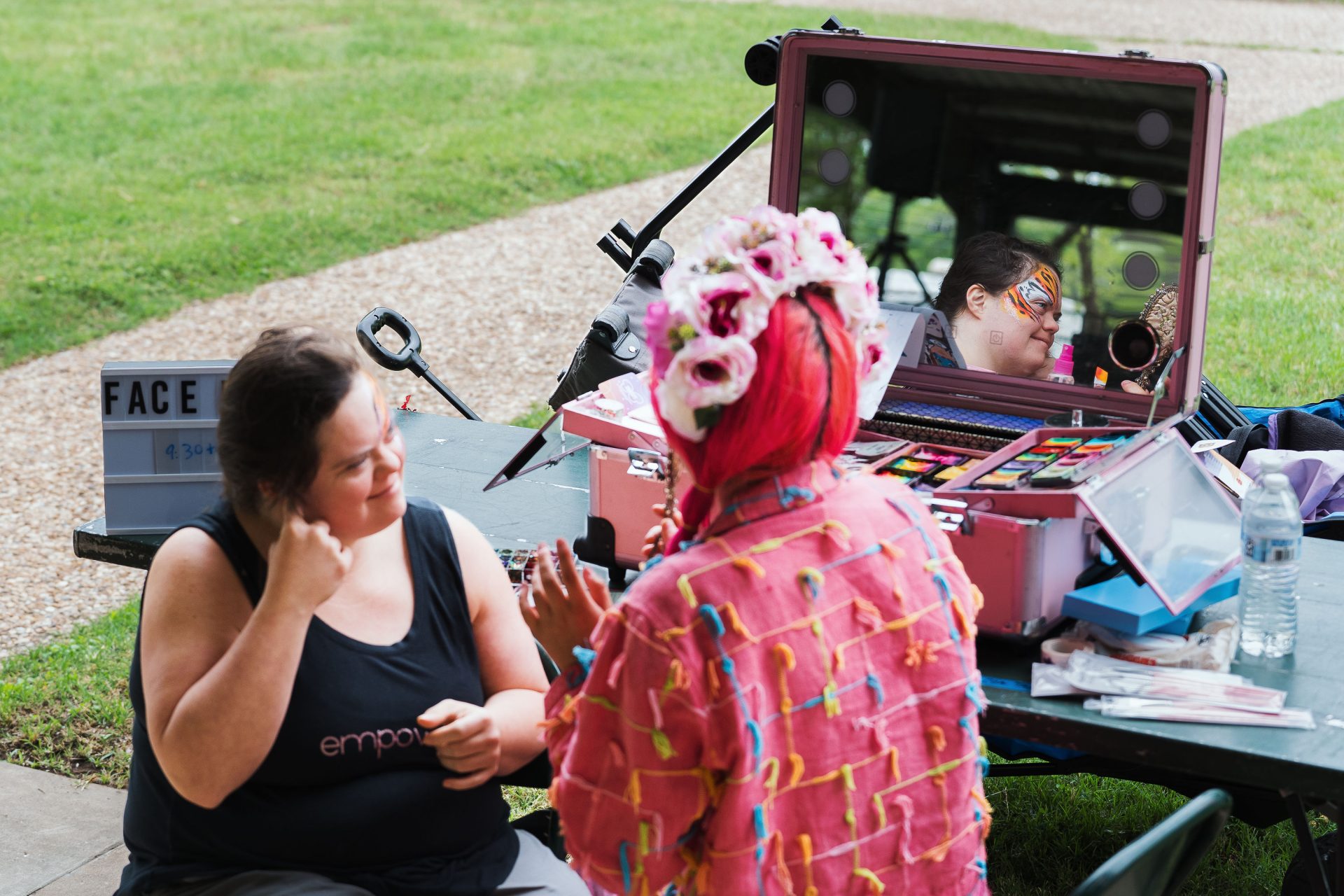 Guest at Art in the Park gets their face painted