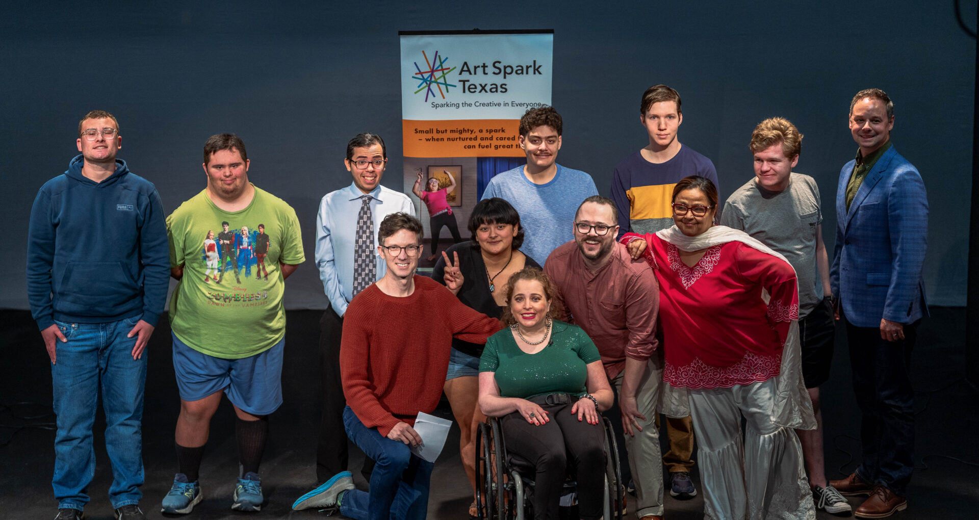 Group photo of the Art Spark Texas Speaking Advocates Program participants at the public showcase.