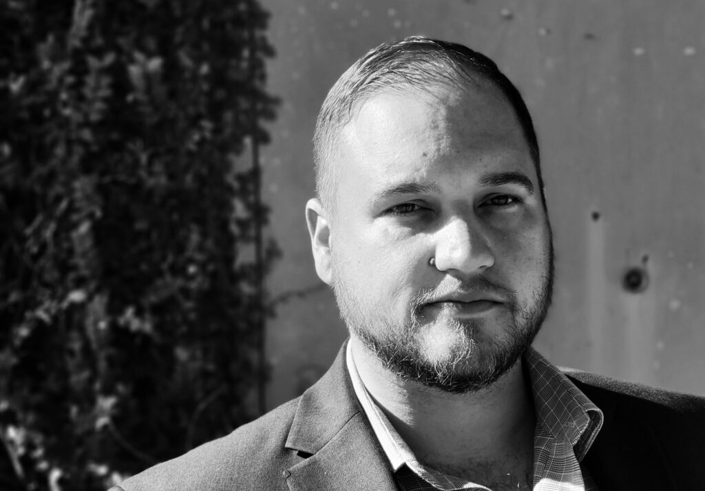 Black and White Close-Up Portrait of Clayton Bradshaw-Mittal