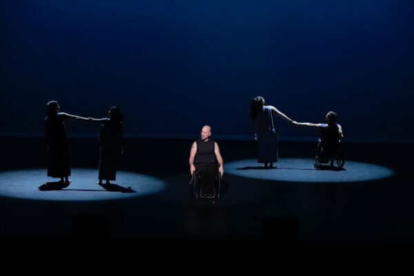 Dwayne on stage between two duets.