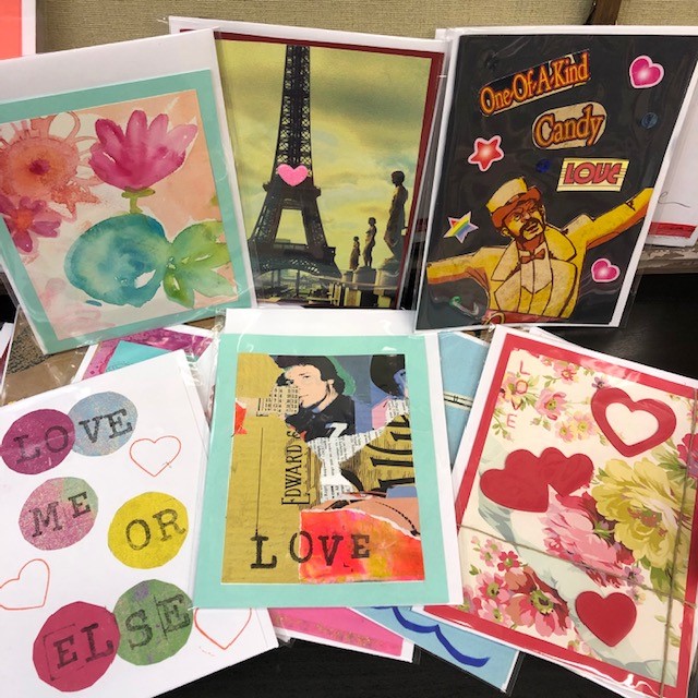 Miscellaneous colorful, handmade greeting cards including collages, the Eiffel tower, valentines and faces