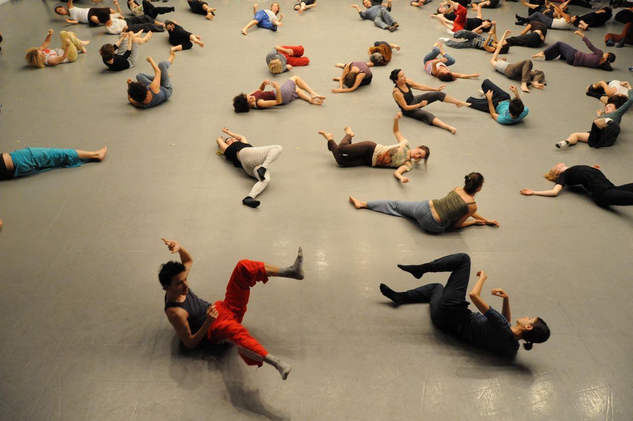 people in various poses on the floor