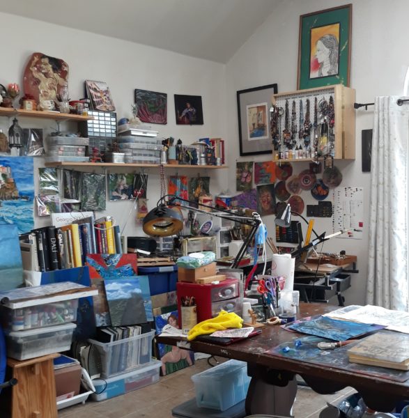 Denise's new studio absolutely filled with artwork and art supplies. 