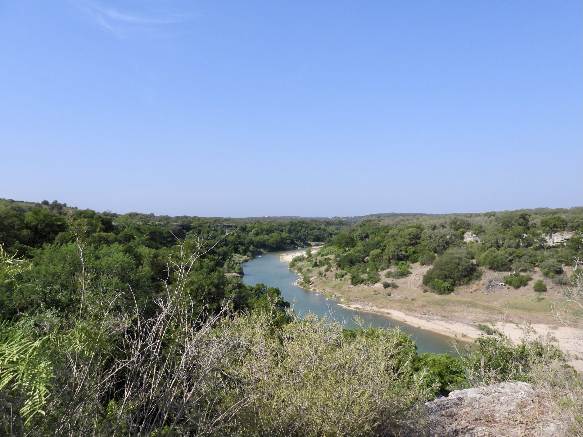 Photo of Pedernales River winding through the Hill Country.