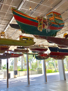 Model boats suspended from ceiling