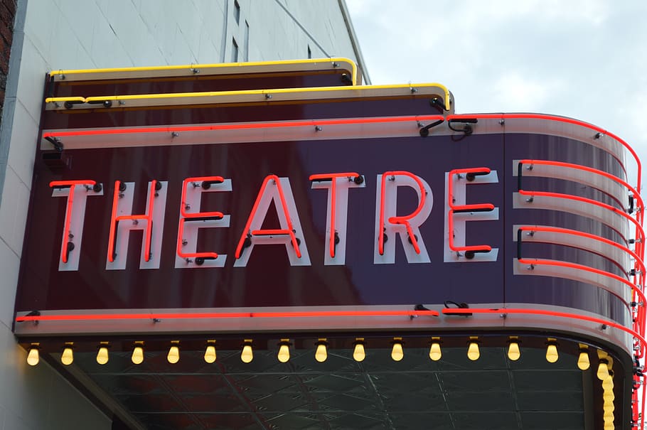 Retro neon movie theatre sign