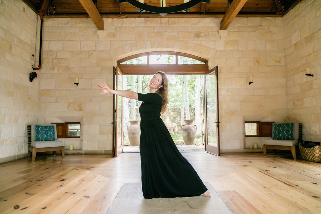 woman dressed in black dancing